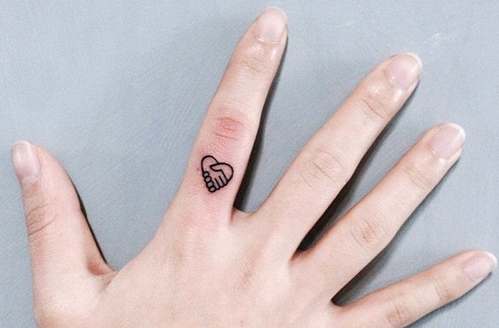 broken heart finger tattoo