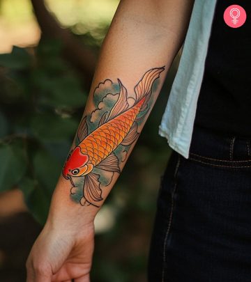 Woman-with-a-koi-fish-tattoo-on-her-right-leg