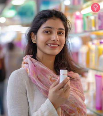 A woman with Indian cosmetics