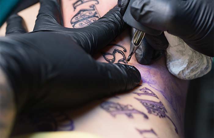 The No BS Guide to Tattoos: Design, Pain, Aftercare, and More