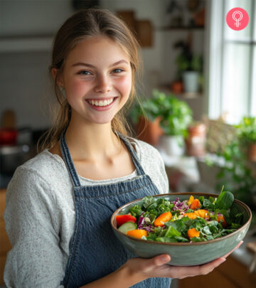 woman eating salad at night