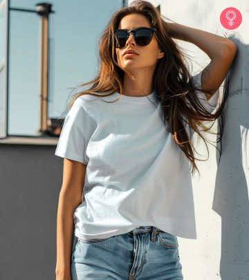 Woman wearing oversized t-shirt to hide the belly fat