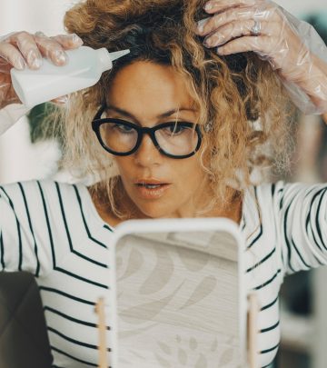 Woman Trying To Do Hair Color Correction