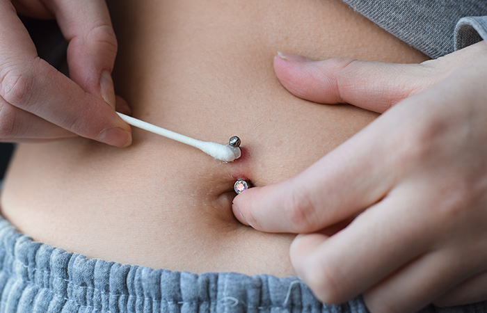 How to take care of infected belly on sale piercing