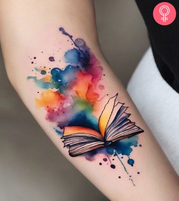 A woman with a book tattoo