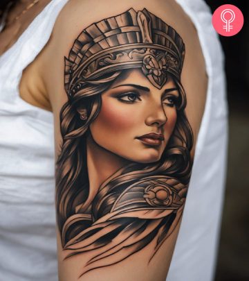 A woman with an Athena tattoo