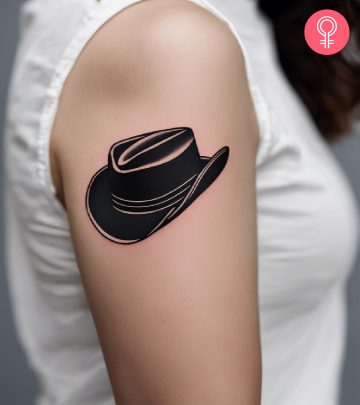 woman with cowboy hat tattoo