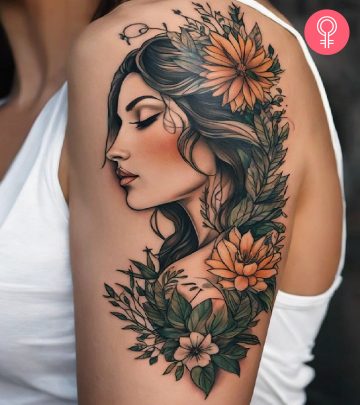 Woman with a Mother Nature tattoo on the upper arm