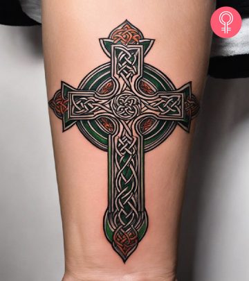 Celtic cross tattoo on the back