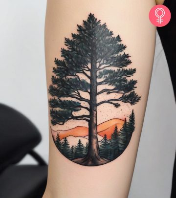 Woman with a pine tree tattoo on her upper arm