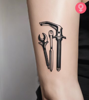 A mechanic tattoo on the upper arm