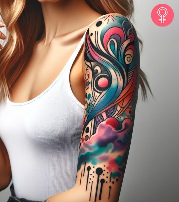Graffiti tattoo on a woman’s upper arm