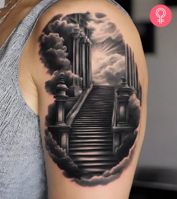 A ‘stairway to heaven’ tattoo on a woman’s upper arm