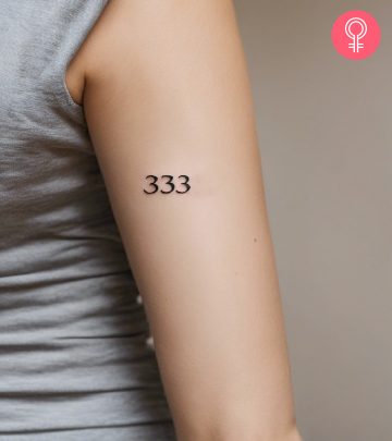 Woman with a 333 tattoo on her arm