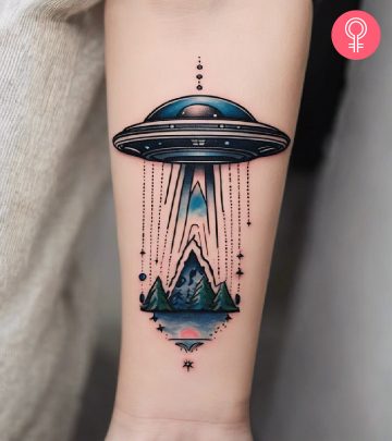 Woman with UFO tattoo on her arm