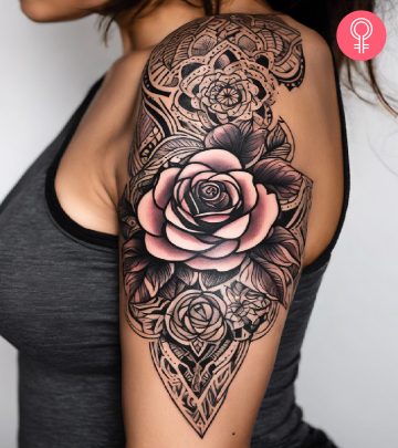 Tribal rose tattoo on the upper arm of a woman