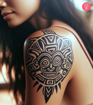 A woman with puerto rican taino shoulder tattoo