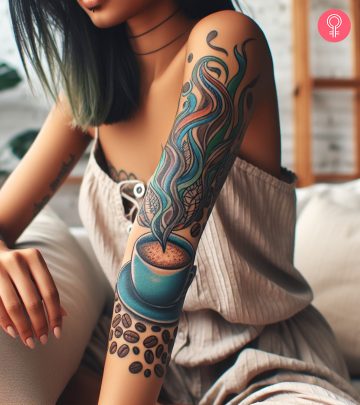A tattoo showing a cup of coffee tattoo on a woman’s arm