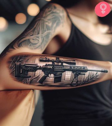 Sniper tattoo on the forearm of a woman