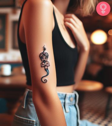 Genie tattoo design on the arm of a woman