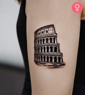 A Colosseum tattoo on a woman’s upper arm
