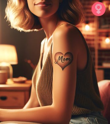 A Mom Heart tattoo on the upper arm