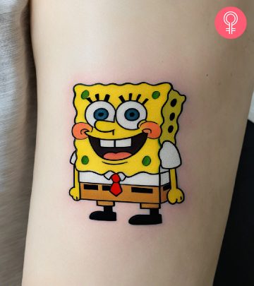 A Spongebob tattoo on the upper arm