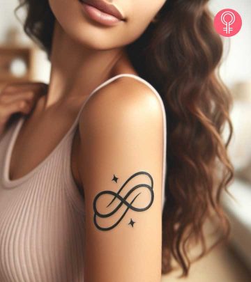 A double infinity tattoo on the upper arm