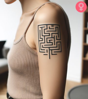 A maze tattoo on the arm of a woman