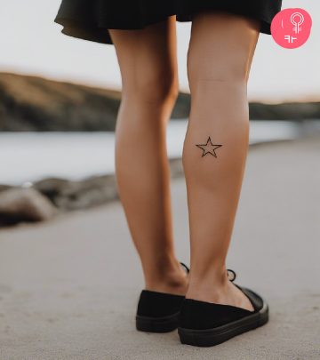A minimalist star tattoo on a woman’s calf
