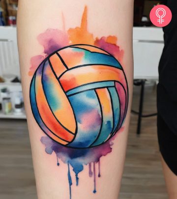 A volleyball tattoo on a woman’s forearm