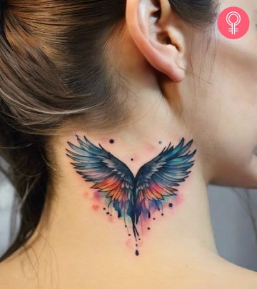 A woman sporting a wings neck tattoo