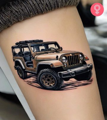 A woman with a colorful jeep tattoo on her upper arm