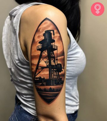 An oilfield tattoo on the upper arm of a woman