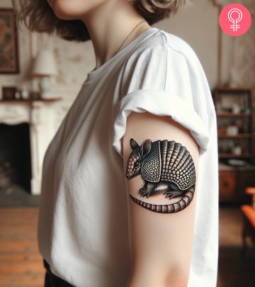 Armadillo tattoo on the arm of a woman