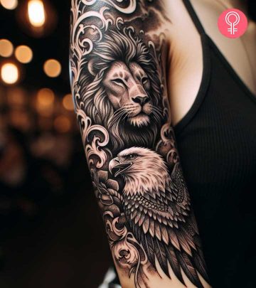 Eagle and lion tattoo on the arm of a woman