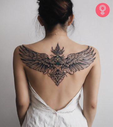 Woman with a Garuda tattoo on her back