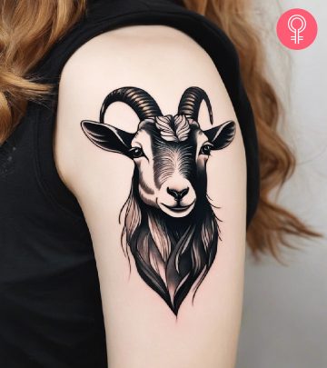 Goat tattoo on the upper arm