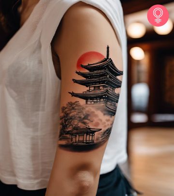 Japanese temple tattoo on the arm of a woman