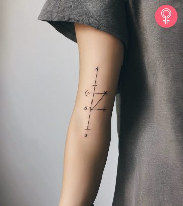 Math tattoo on the upper arm