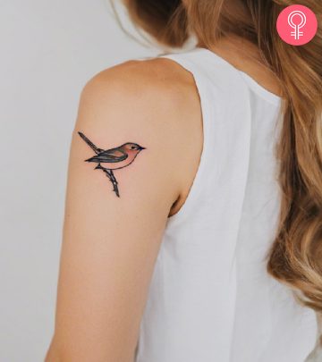 Nightingale tattoo on a woman’s upper arm