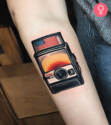 Polaroid tattoo on the forearm of a woman