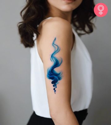 Smoke tattoo on a woman’s arm