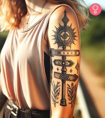 Street sign tattoo on the arm of a woman