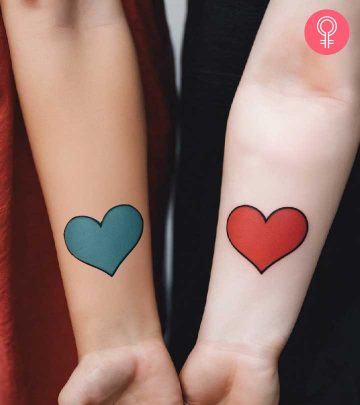 Twin tattoos on the forearm featuring hearts
