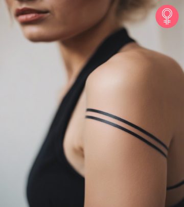 Two-line tattoo on the arm of a woman