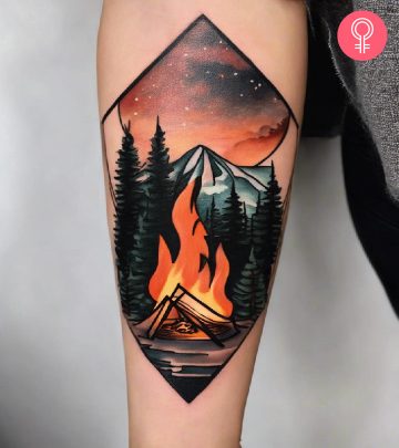 Woman with campfire tattoo on her lower arm