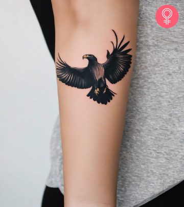 Woman with condor tattoo on her arm