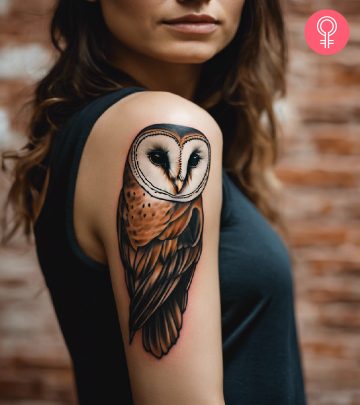 A woman with a colored barn owl tattoo on her upper arm