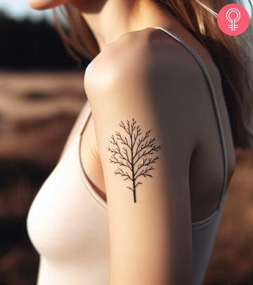 A woman with a floral upper back tattoo